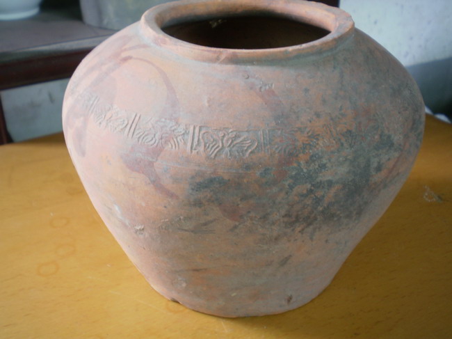 古代红彩摸印红陶罐