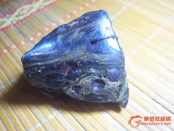 天然玻璃陨石图片_真正的石陨石图片大全