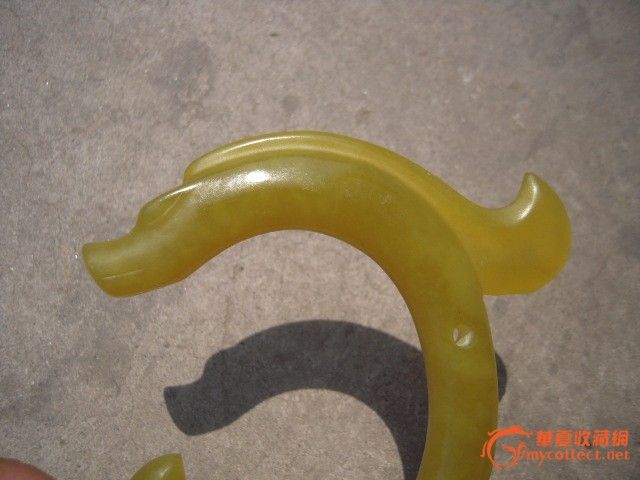 华夏短信通标志黄玉C字龙-华夏短信通标志黄