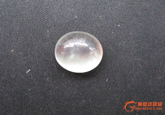 一颗无色透明的真正玻璃种的蛋面老翡翠戒面!!! _一颗无色透明的真正玻璃种的蛋面老翡翠戒面!!! 价格_一颗无色透明的真正玻璃种的蛋面老翡翠戒面!!! 图片_来自藏友神州走遍_玉器_地摊交易_华夏收藏网 cang.com