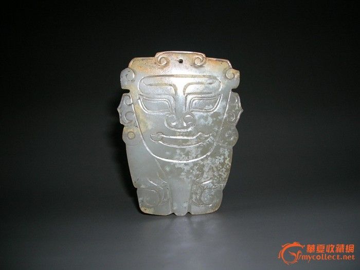 西周 人面形佩!